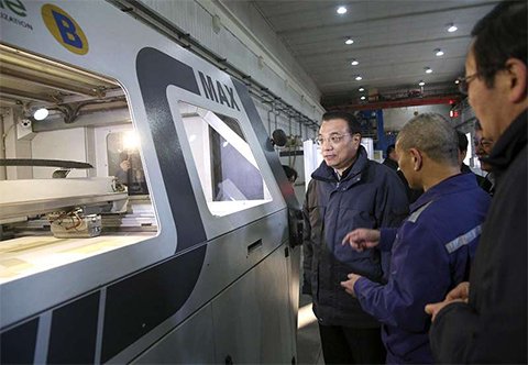 李克強贊這家企業一分鐘穿越了兩個時代 