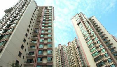 復旦金融專家:房價漲七八倍 后悔當年沒借錢買房