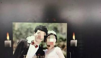 浙江夫妻收到最恐怖結婚照  照片兩側插白蠟燭(圖)
