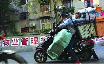 "雙11"快遞投遞高峰抵青 每天投送50萬件(圖)