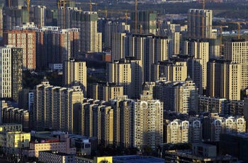 穩(wěn)樓市“組合拳”將出 首套房貸首付或降至兩成