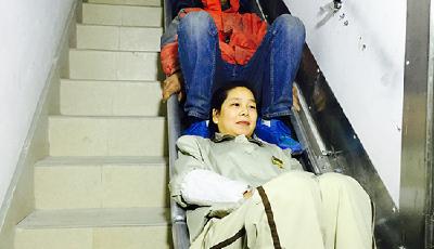 上海七旬老人研發(fā)逃生"神梯" 26樓到1樓僅需90秒