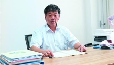 用传承的实干精神兴校