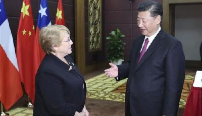 習近平同智利總統巴切萊特一道出席中智自由貿易協定升級議定書簽字儀式