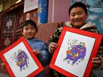 木版上“印”出年味