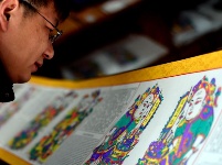 木版上“印”出年味