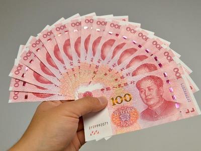 人民币中间价调升102点　站上近三年高位