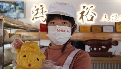 年味漸濃虎年大饅頭受熱捧
