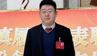 两会声音｜杨昆：多措并举缓解主城区停车难问题